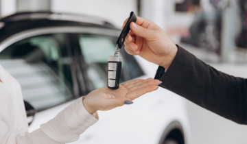 Man,Handing,Car,Smart,Key.,Car,Rental.,Car,Sharing.