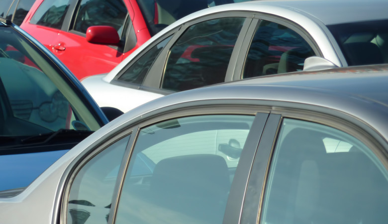 Telephoto,View,Of,Cars,Parked,In,Parking,Lot.,Image,Can